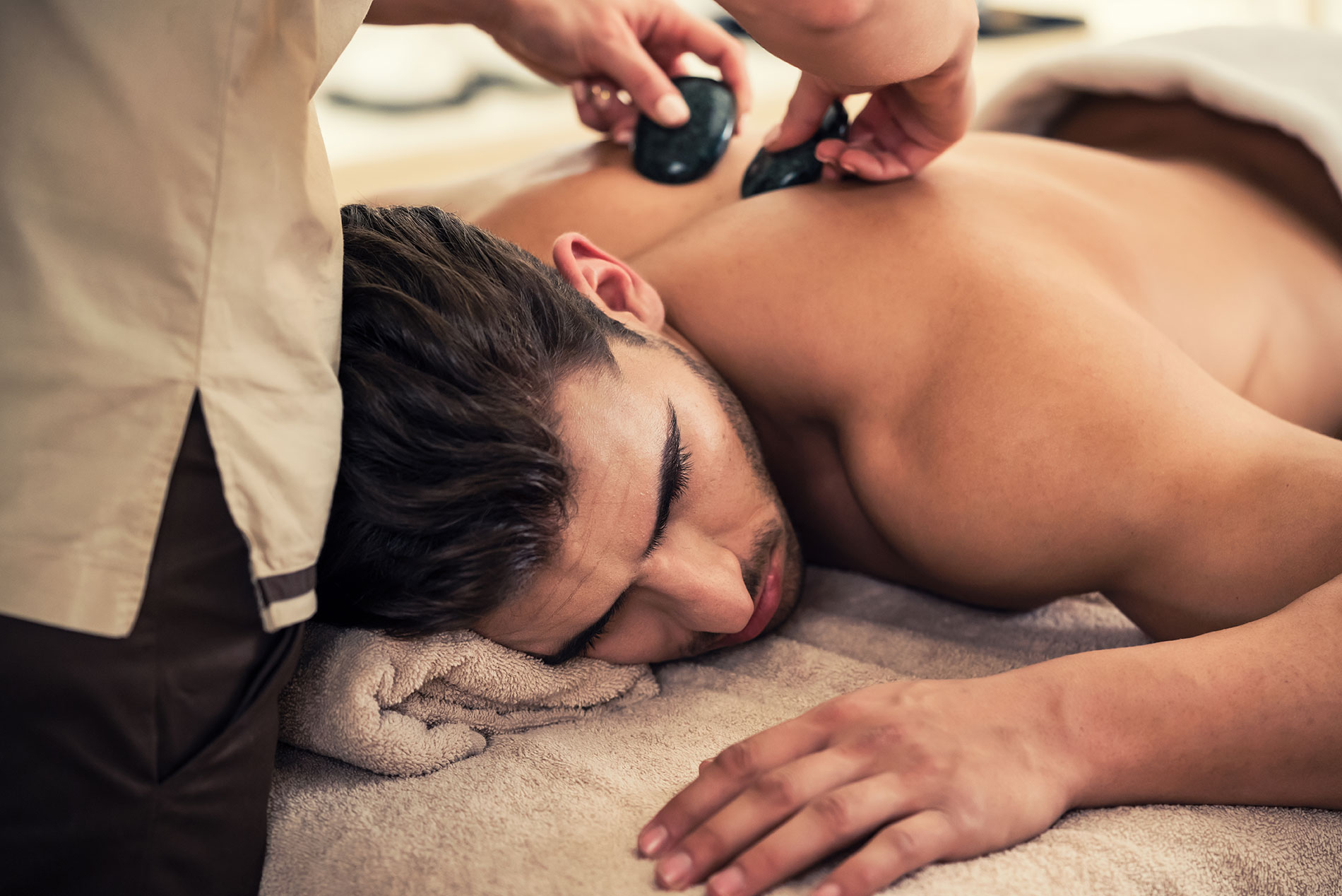 The Marvel of Hot Stone Massage: Unveiling the Therapeutic Wonders